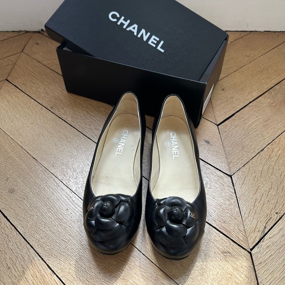 CHANEL Shoes - Chanel Black Flats with Classic Camellia Detail